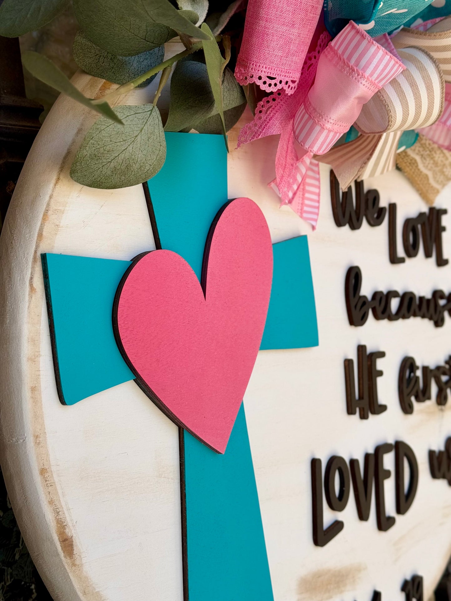 We love because he first loved us Sign