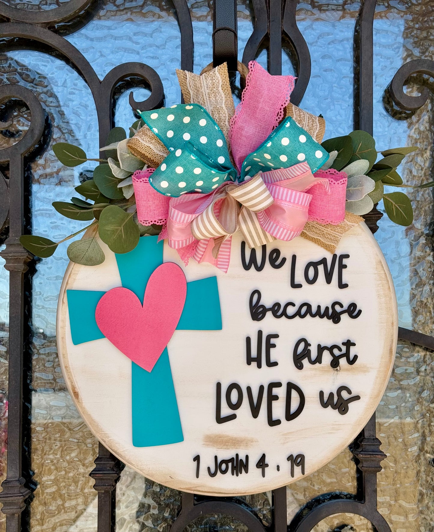 We love because he first loved us Sign